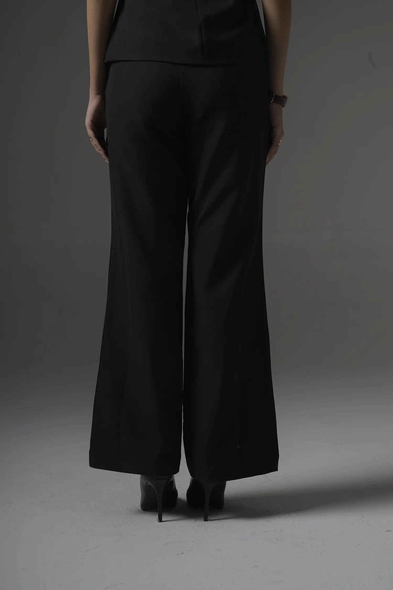 Front view of Muggnos top with chic detailing