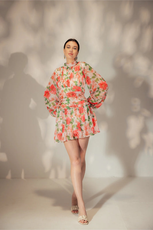 Front view of short floral print dress with vibrant colors